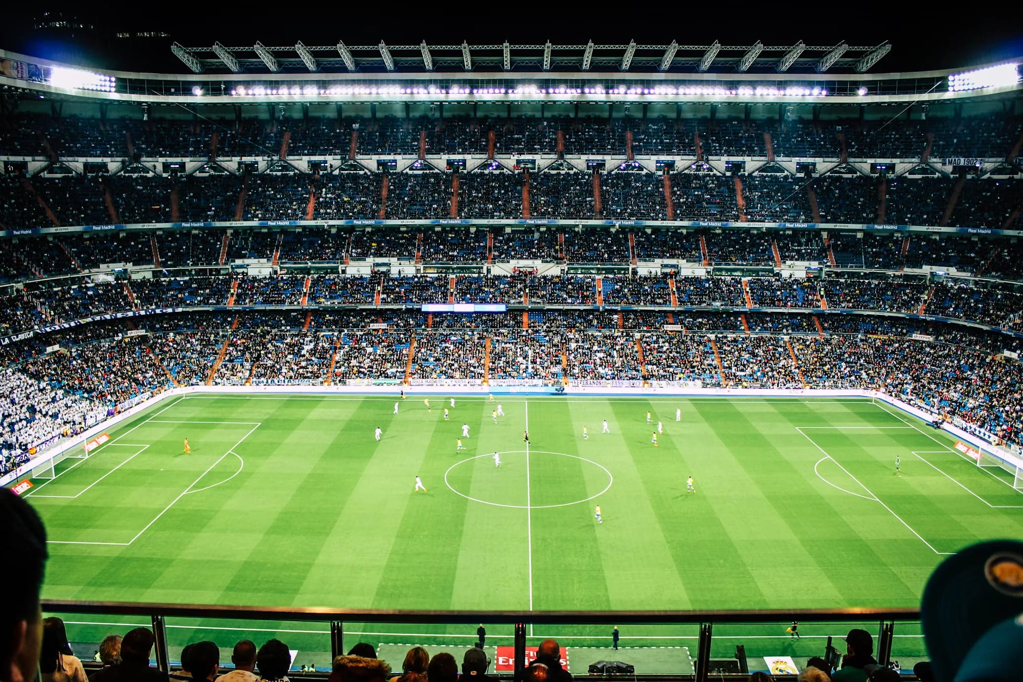 Champions League football stadium with blue running track